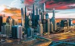 imar - Center News Network Futuristic city skyline at sunset with tall glass skyscrapers and elevated highways nearby.