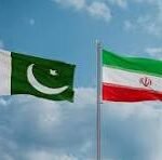 Two national flags waving in a clear blue sky: Pakistan on the left and Iran on the right.