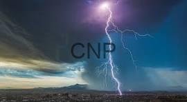 weath - Center News Network Lightning bolt striking over a flat desert landscape at dusk with a stormy sky; watermark 'CNP' across the center.