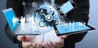 Hands holding a tablet with glowing holographic icons and a globe, symbolizing global digital connectivity and cloud computing.