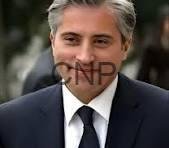 jaa - Center News Network Man in a dark suit and tie, outdoors, with a neutral expression (watermark 'CNP' visible).