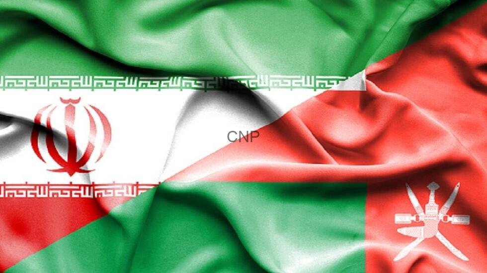 Wrinkled flags of Iran (left) and Oman (right) with 'CNP' text in the center to indicate a cross-country theme.