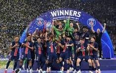 san - Center News Network Sports team celebrating a championship on a podium with a blue 'WINNERS' arch and confetti scattered around.