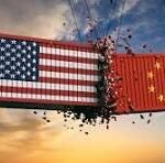 Banner showing the US flag on the left and the Chinese flag on the right tearing apart in midair at sunset, symbolizing US–China tension or competition.