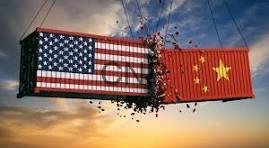 usa ch - Center News Network Banner showing the US flag on the left and the Chinese flag on the right tearing apart in midair at sunset, symbolizing US–China tension or competition.