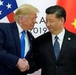 Donald Trump and Xi Jinping shake hands at a U.S.–China meeting, with American and Chinese flags in the background.