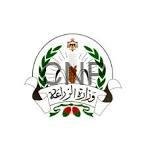 Official emblem featuring a green laurel wreath surrounding an open book and scales, with a crown on top and a banner bearing Arabic text.