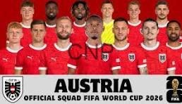 NAMSA - Center News Network Austria national football team squad photo in red jerseys, posing in two rows for FIFA World Cup 2026.