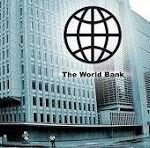 Exterior view of The World Bank headquarters with its globe logo overlay on the building’s facade.