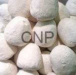 jameed - Center News Network Pile of pastel, round candies with a powdery coating, featuring a faint CNP watermark over the center.