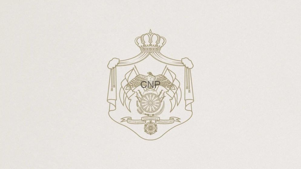 image - Center News Network Coat of arms style emblem: crown atop a shield with ornate scrollwork and a central wheel, bearing the letters CNP