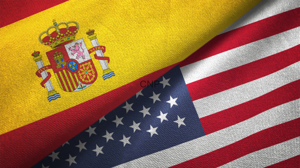 image - Center News Network Flag collage combining the Spanish flag with the United States flag, with a faint 'CNP' watermark in the center.