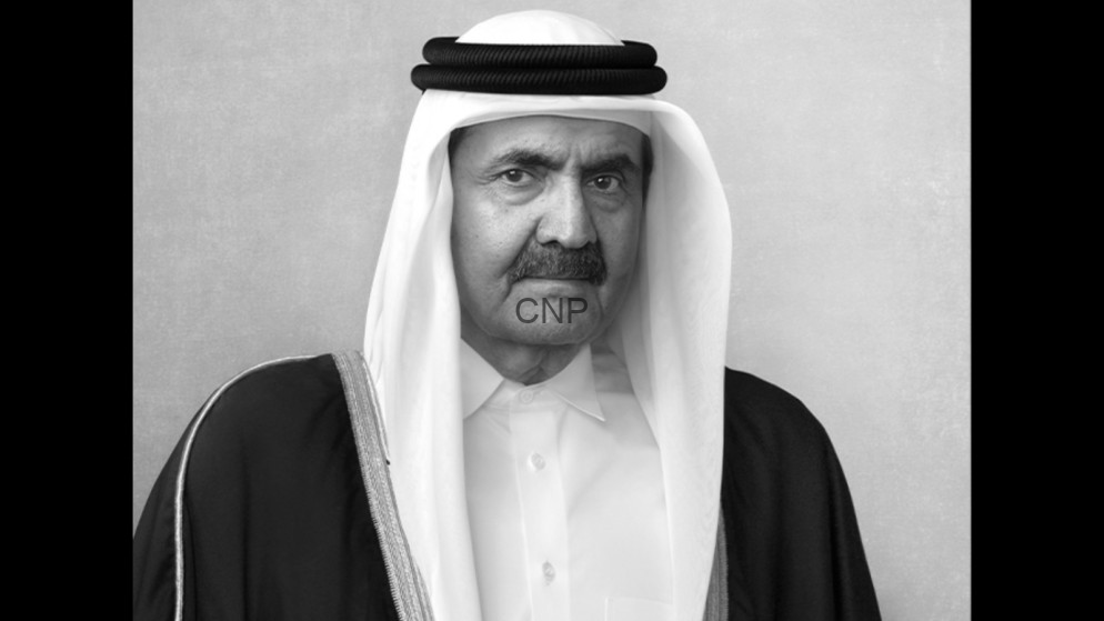 image - Center News Network Black-and-white portrait of an older man wearing traditional Arab dress, facing the camera.