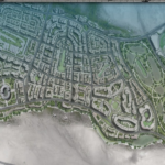 Bird’s-eye view of a coastal city with dense streets, highways, and a large golf course on the right side near green hills.