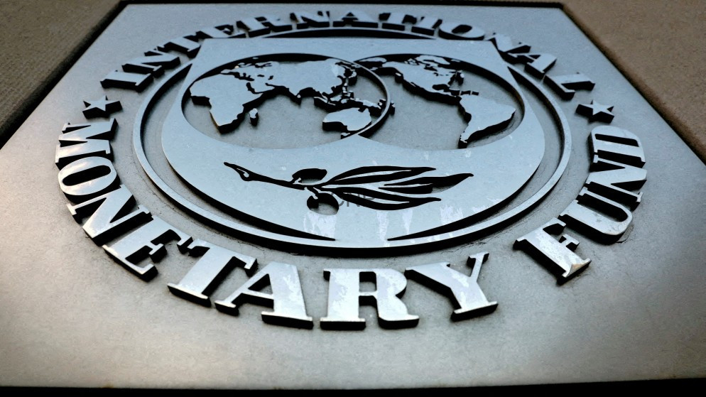 Metal circular plaque featuring the United Nations emblem: a world map with a flying dove and raised surrounding text